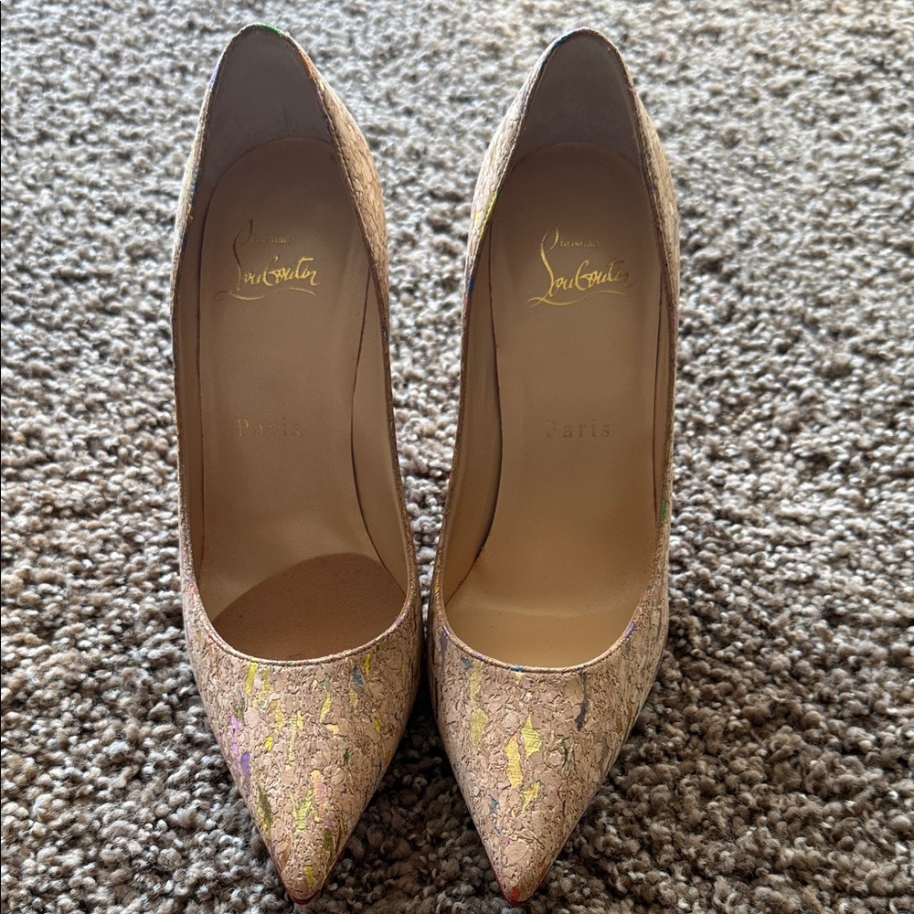 Christian Louboutin Beige cork pump.